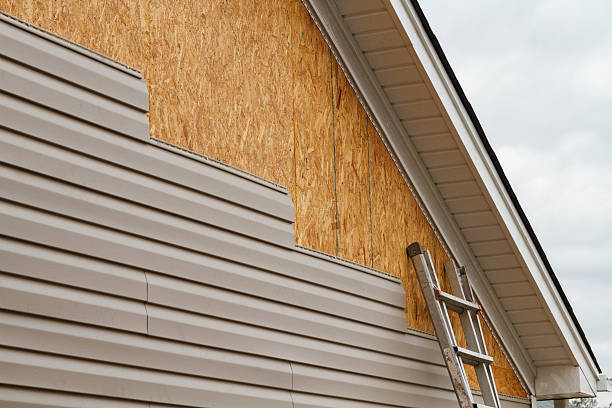 Professional Emergency Siding Repair technician working in West Farmington, OH